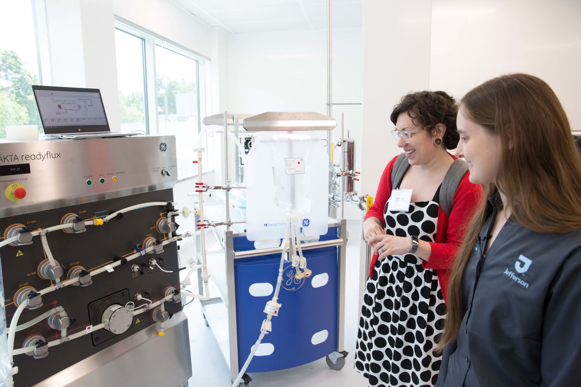 Two women touring the JIB building.