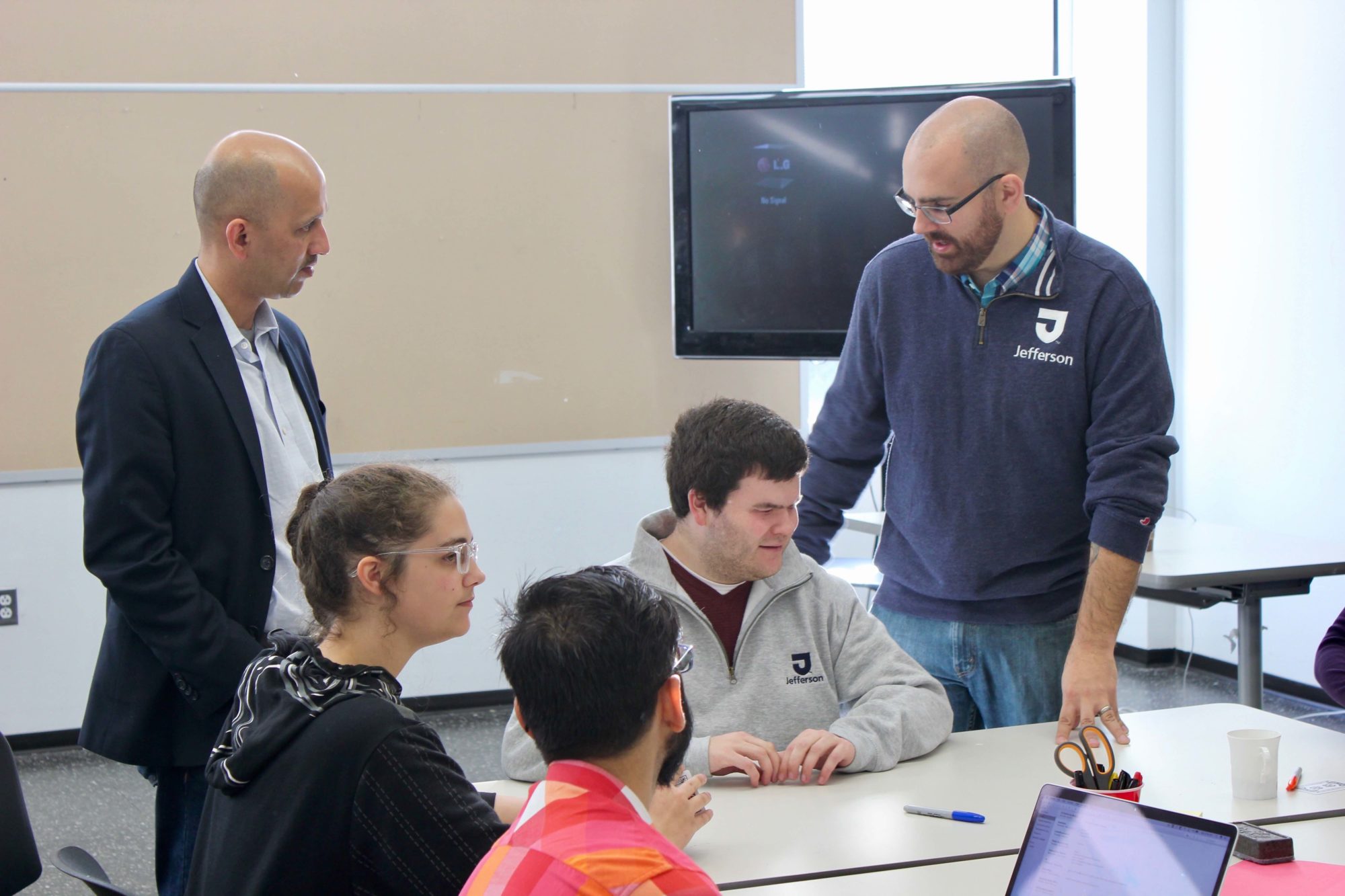 Nick Gomberg collaborates with students and faculty during one of the MS in user experience and interaction design program’s Saturday intensives.