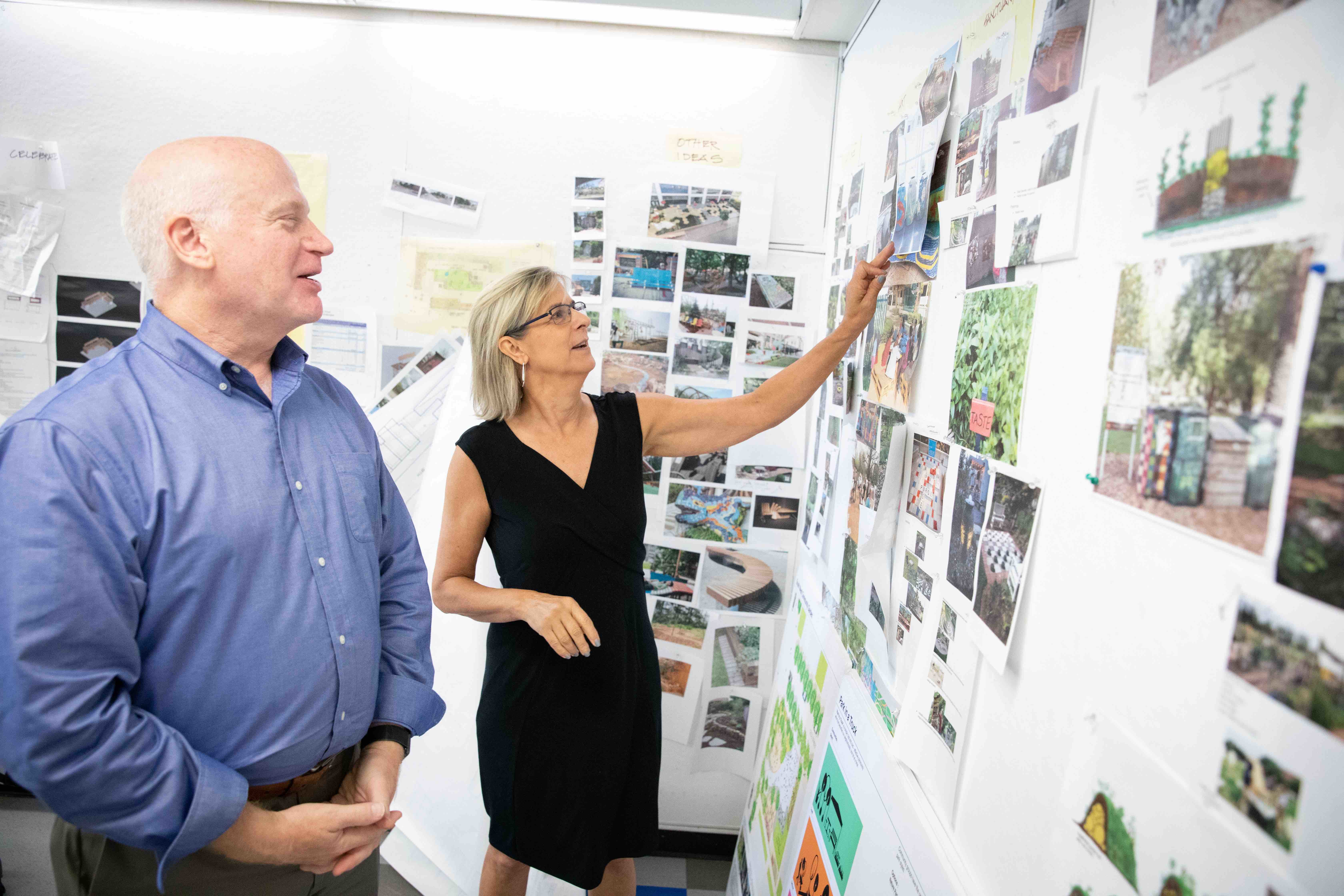 Jefferson faculty members Drew Harris and Kim Douglas examine mockups of Park in a Truck