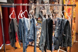 Jeans on hanging on hangers